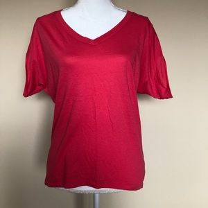 Express coral-colored cold shoulder tee